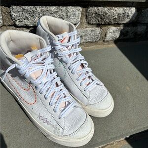 Nike White High-Top Sneakers with Colorful Stitching